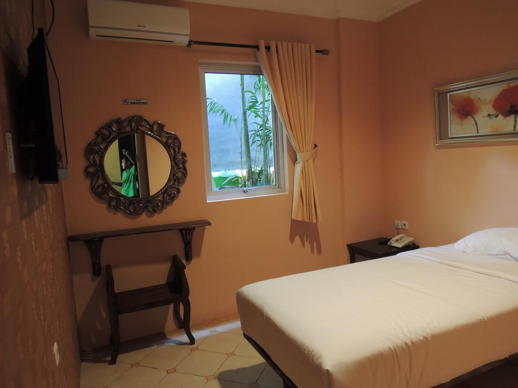 Twins Hotel Jacarta Quarto foto